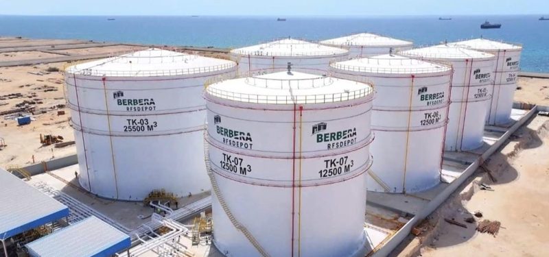 Aerial view of white fuel storage tanks at Berbera RFS Depot on the coast of Somaliland