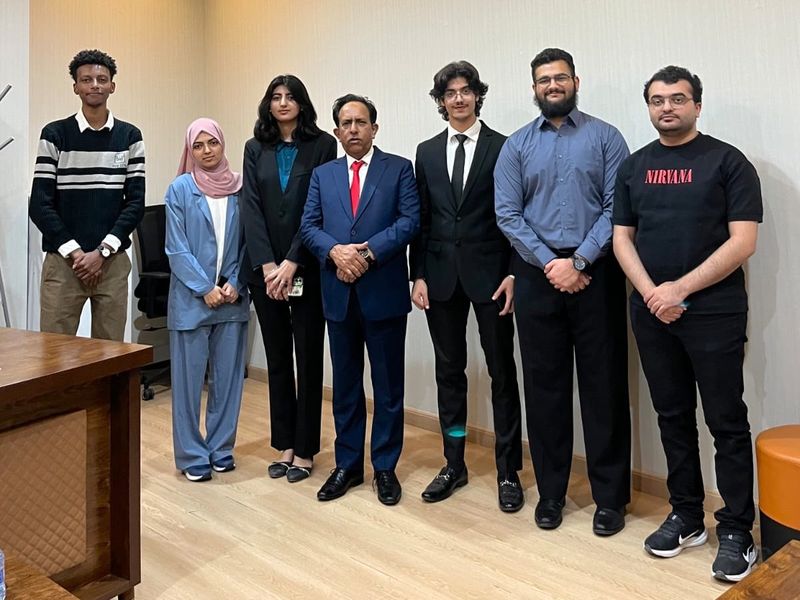 Students who took part in the IIC workshop standing with the IIC team